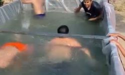 Sıcaktan bunalan gençlerin havuz keyfi görenleri güldürdü