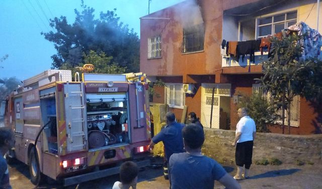 Kozan'da ev yangını korku dolu anlar yaşattı