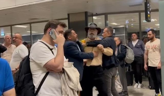 Ünlü ismin havaalanında yolcu ile tartışması kameralara yansıdı